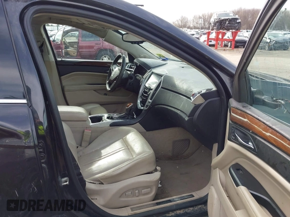 2013 Cadillac SRX Luxury Collection z VIN 3GYFNCE35DS607553, wystawiony jako IAAI lot #42151522 z przebiegiem 104 688 mil mil oraz . Historia ofert i sprzedaży dostępna na DreamBid. Obrazek 5.