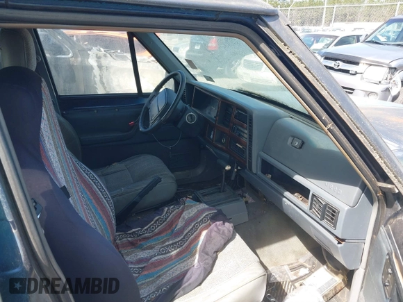 1996 Jeep Cherokee Country with VIN 1J4FT78S5TL148433, listed as a IAAI auction lot 41722054 with 276,612 mi miles and . Bid and sale history available at DreamBid. Image 5.