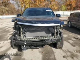 2024 Cadillac Escalade 4WD Premium Luxury with VIN 1GYS4BKL1RR181502, listed as a Copart auction lot 77155704 with 6,588 mi miles and Salvage title. Bid and sale history available at DreamBid. Image 5.