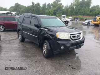 2010 Honda Pilot Touring z VIN 5FNYF4H91AB033801, wystawiony jako IAAI lot #42329934 z przebiegiem 186 041 mil mil oraz . Historia ofert i sprzedaży dostępna na DreamBid. Obrazek 1.