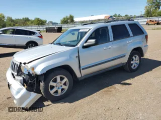 2009 Jeep Grand Cherokee Laredo with VIN 1J8HR48P29C537653, listed as a Copart auction lot 70190404 with 192,796 mi miles and Salvage Title. Bid and sale history available at carsss.com. Image 1.