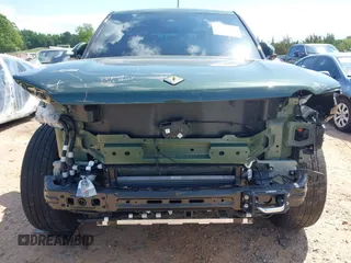 2023 Rivian R1T Adventure z VIN 7FCTGAAAXPN019894, wystawiony jako IAAI lot #42168226 z przebiegiem 23 380 mil mil oraz . Historia ofert i sprzedaży dostępna na DreamBid. Obrazek 6.