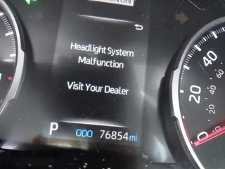 2021 Toyota RAV4 XLE with VIN 2T3W1RFV3MW164777, listed as a IAAI auction lot 41708032 with 76,854 mi miles. Bid and sale history available at carsss.com. Image 16.