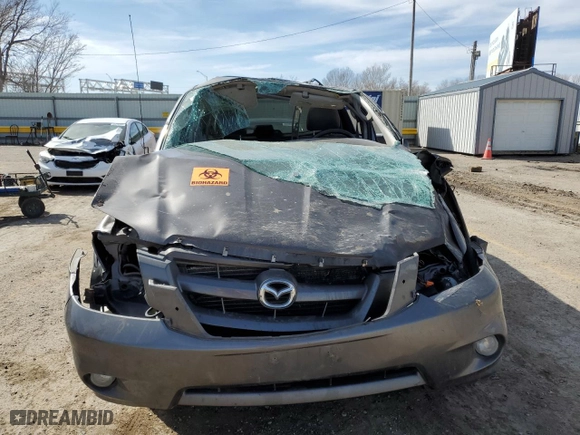2006 Mazda Tribute s with VIN 4F2YZ961X6KM35781, listed as a Copart auction lot 44906664 with 0 mi miles and Salvage Title. Bid and sale history available at carsss.com. Image 5.