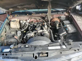 1999 Chevrolet Tahoe with VIN 1GNEC13RXXJ385740, listed as a Copart auction lot 86870484 with 271,302 mi miles and Salvage Title. Bid and sale history available at carsss.com. Image 12.