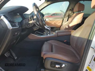 2020 BMW X5 M50i with VIN 5UXJU4C01LLE45993, listed as a Copart auction lot 88904235 with 64,841 mi miles and Salvage Title. Bid and sale history available at DreamBid. Image 7.