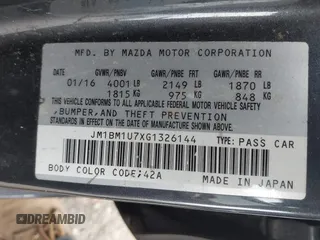 2016 Mazda 3 i Sport with VIN JM1BM1U7XG1326144, listed as a IAAI auction lot 41764294 with 189,642 mi miles and . Bid and sale history available at DreamBid. Image 9.