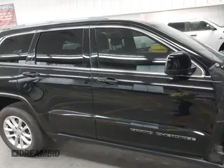 2021 Jeep Grand Cherokee Laredo E z VIN 1C4RJEAG7MC738928, wystawiony jako IAAI lot #42708702 z przebiegiem 63 329 mil mil oraz . Historia ofert i sprzedaży dostępna na DreamBid. Obrazek 13.