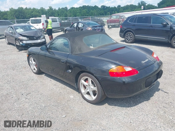 2002 Porsche Boxster S z VIN WP0CB29842U663272, wystawiony jako IAAI lot #42604562 z przebiegiem 68 927 mil mil oraz . Historia ofert i sprzedaży dostępna na DreamBid. Obrazek 3.