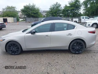 2024 Mazda 3 S Select Sport with VIN 3MZBPABM0RM403431, listed as a IAAI auction lot 42366921 with Not provided miles and . Bid and sale history available at DreamBid. Image 14.