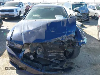 2014 Dodge Charger SXT with VIN 2C3CDXJGXEH255123, listed as a IAAI auction lot 41679977 with 153,032 mi miles. Bid and sale history available at carsss.com. Image 13.
