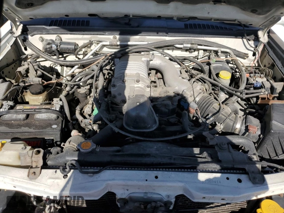 2002 Nissan Frontier SC z VIN 1N6MD29Y52C369414, wystawiony jako Copart lot #58532505 z przebiegiem 249 926 mil mil oraz Szkoda całkowita • Salvage title. Historia ofert i sprzedaży dostępna na DreamBid. Obrazek 11.