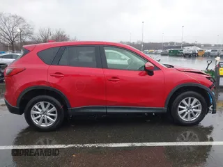 2015 Mazda CX-5 Touring with VIN JM3KE4CY3F0529669, listed as a IAAI auction lot 41866873 with 137,635 mi miles and . Bid and sale history available at carsss.com. Image 13.
