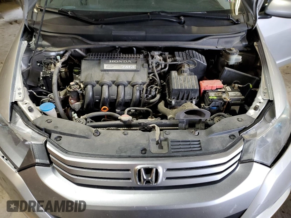 2010 Honda Insight EX with VIN JHMZE2H76AS021610, listed as a Copart auction lot 62992225 with 162,974 mi miles and Salvage title. Bid and sale history available at DreamBid. Image 11.