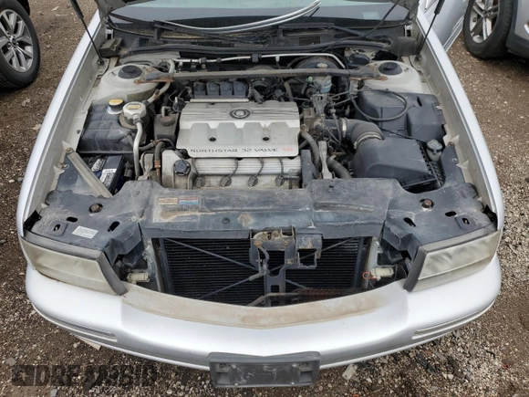 1999 Cadillac DeVille z VIN 1G6KD54Y2XU807846, wystawiony jako Copart lot #53070705 z przebiegiem Nie podano mil oraz Czysty tytuł • Clean title. Historia ofert i sprzedaży dostępna na DreamBid. Obrazek 11.