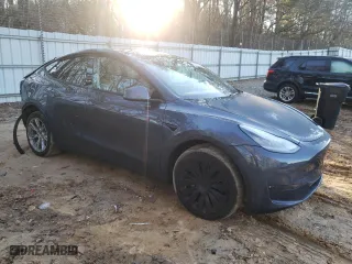 2023 Tesla Model Y Long Range with VIN 7SAYGDEE6PA081723, listed as a Copart auction lot 87232354 with 28,774 mi miles and Salvage Title. Bid and sale history available at carsss.com. Image 4.