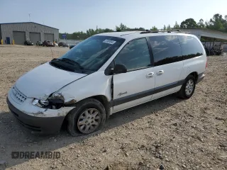 1999 Plymouth Voyager Grand SE z VIN 1P4GP44G7XB592371, wystawiony jako Copart lot #65111334 z przebiegiem 119 548 mil mil oraz Szkody całkowita. Historia ofert i sprzedaży dostępna na DreamBid. Obrazek 1.