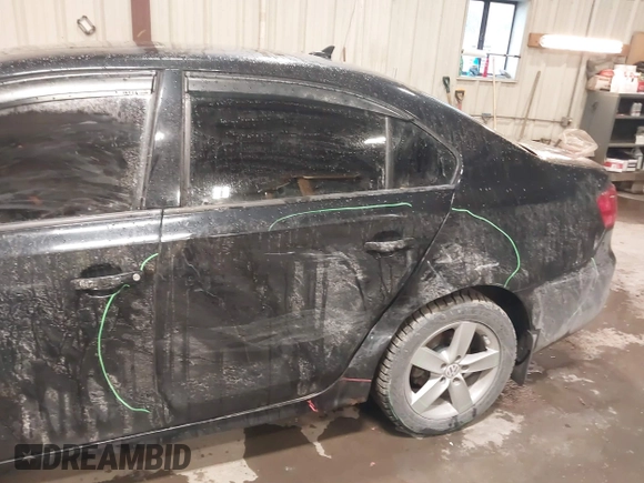 2012 Volkswagen Jetta TDI with VIN 3VWLL7AJXCM031579, listed as a IAAI auction lot 41227325 with 123,273 mi miles and . Bid and sale history available at DreamBid. Image 6.