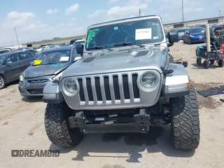2021 Jeep Wrangler Unlimited High Altitude with VIN 1C4HJXEG3MW511185, listed as a IAAI auction lot 42125883 with 45,564 mi miles and . Bid and sale history available at DreamBid. Image 12.