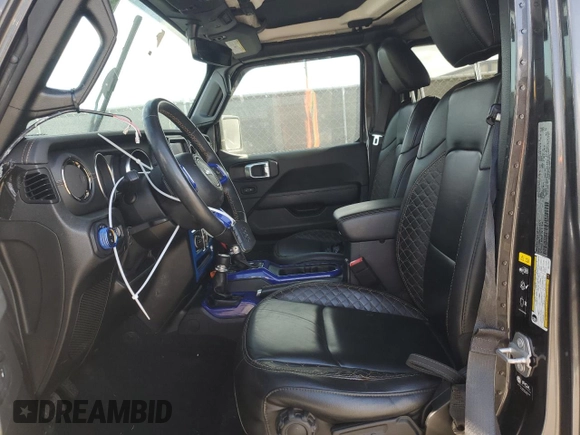 2021 Jeep Gladiator Overland with VIN 1C6HJTFG2ML517477, listed as a Copart auction lot 50061065 with 27,443 mi miles and Salvage title. Bid and sale history available at DreamBid. Image 7.