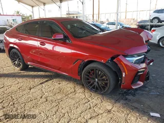 2022 BMW X6 xDrive40i with VIN 5UXCY6C06N9K57184, listed as a IAAI auction lot 41302467 with 42,073 mi miles. Bid and sale history available at carsss.com. Image 1.