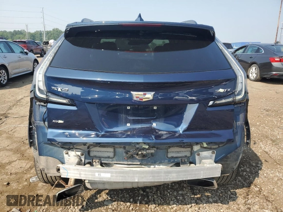 2020 Cadillac XT4 AWD Sport z VIN 1GYFZFR47LF140227, wystawiony jako Copart lot #63984125 z przebiegiem 36 080 mil mil oraz Czysty tytuł • Clean title. Historia ofert i sprzedaży dostępna na DreamBid. Obrazek 6.