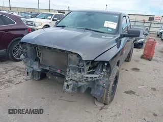 2020 Ram 1500 Classic Tradesman with VIN 1C6RR6FG0LS114553, listed as a IAAI auction lot 41293058 with 143,353 mi miles. Bid and sale history available at carsss.com. Image 2.