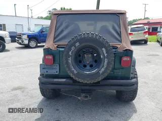 2000 Jeep Wrangler Sahara with VIN 1J4FA59S8YP722208, listed as a IAAI auction lot 42294978 with 238,024 mi miles and . Bid and sale history available at DreamBid. Image 16.