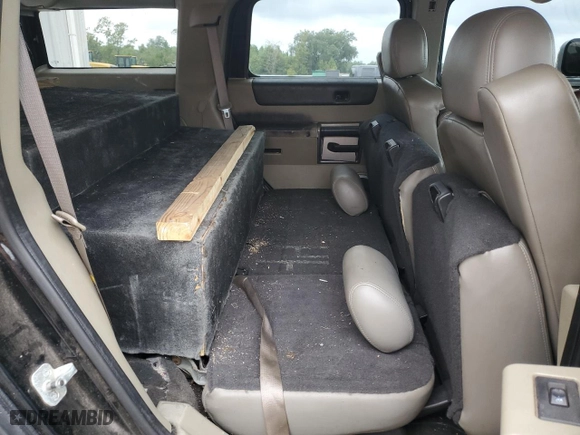 2003 Hummer H2 with VIN 5GRGN23UX3H121939, listed as a Copart auction lot 69503424 with 170,144 mi miles and Salvage Title. Bid and sale history available at carsss.com. Image 11.