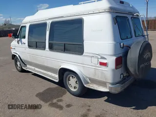 1995 GMC Vandura z VIN 1GDEG25K3SF542874, wystawiony jako IAAI lot #41792770 z przebiegiem 176 778 mil mil oraz . Historia ofert i sprzedaży dostępna na DreamBid. Obrazek 3.