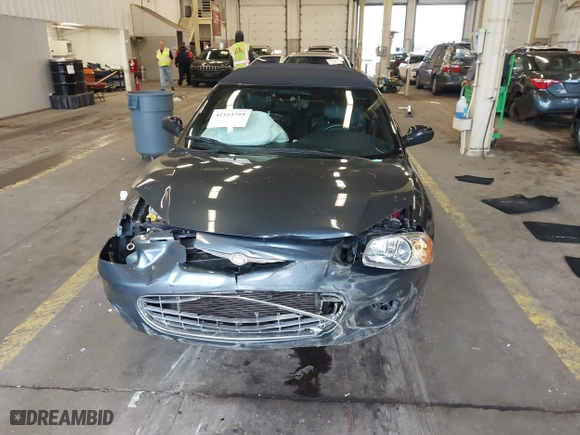 2002 Chrysler Sebring Limited with VIN 1C3EL65R92N272242, listed as a IAAI auction lot 41164755 with 52,086 mi miles. Bid and sale history available at carsss.com. Image 12.