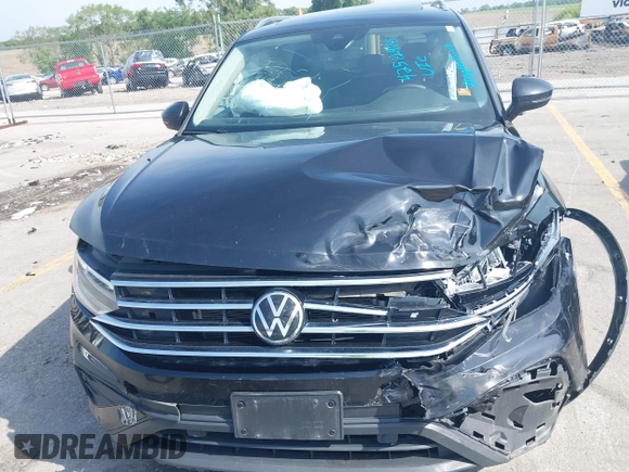 2022 Volkswagen Tiguan SE with VIN 3VV2B7AX0NM146315, listed as a IAAI auction lot 42512975 with 40,577 mi miles and . Bid and sale history available at DreamBid. Image 12.