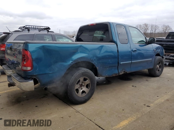 2000 Ford F-150 XL with VIN 1FTRX17W5YNA58235, listed as a Copart auction lot 84026504 with 0 mi miles and Salvage Title. Bid and sale history available at carsss.com. Image 3.