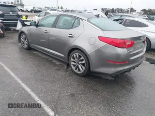 2014 Kia Optima SXL Turbo with VIN 5XXGR4A65EG342564, listed as a IAAI auction lot 41725578 with 159,937 mi miles and . Bid and sale history available at DreamBid. Image 3.