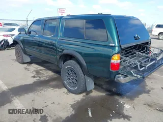 2001 Toyota Tacoma PreRunner with VIN 5TEGN92N91Z746705, listed as a IAAI auction lot 41947911 with 285,165 mi miles and . Bid and sale history available at DreamBid. Image 3.