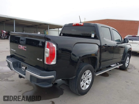 2015 GMC Canyon 2WD SLE with VIN 1GTG5BE30F1139093, listed as a IAAI auction lot 41596657 with 143,834 mi miles. Bid and sale history available at carsss.com. Image 4.