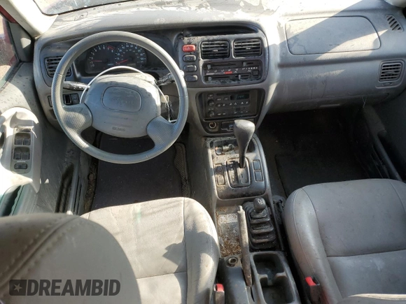 2001 Chevrolet Tracker LT z VIN 2CNBJ634716945832, wystawiony jako Copart lot #61967345 z przebiegiem 136 403 mil mil oraz Szkoda całkowita • Salvage title. Historia ofert i sprzedaży dostępna na DreamBid. Obrazek 8.
