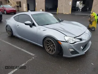 2016 Scion FR-S with VIN JF1ZNAA1XG8709798, listed as a IAAI auction lot 41713314 with 139,450 mi miles. Bid and sale history available at carsss.com. Image 1.