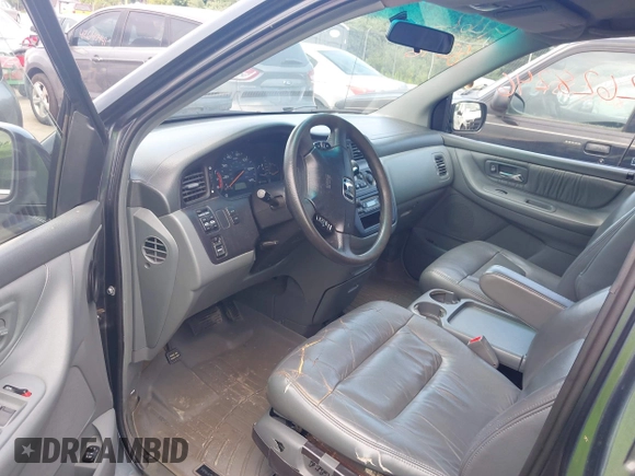 2004 Honda Odyssey EX-L with VIN 5FNRL189X4B045459, listed as a IAAI auction lot 42628246 with 181,328 mi miles and . Bid and sale history available at DreamBid. Image 5.