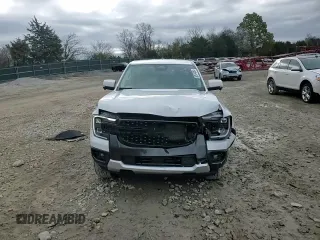 2024 Ford Ranger LARIAT with VIN 1FTER4KH8RLE25001, listed as a Copart auction lot 80974064 with 9,026 mi miles and Salvage Title. Bid and sale history available at carsss.com. Image 10.