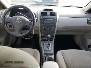 2012 Toyota Corolla L with VIN 2T1BU4EE6CC868233, listed as a Copart auction lot 51265335 with 187,086 mi miles and Salvage Title. Bid and sale history available at DreamBid. Image 8.