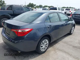 2018 Toyota Corolla L with VIN 5YFBURHE8JP770696, listed as a IAAI auction lot 42386025 with 63,224 mi miles and . Bid and sale history available at DreamBid. Image 4.
