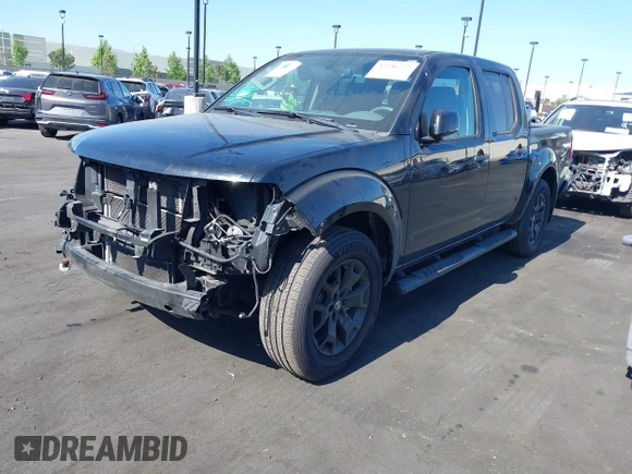 2021 Nissan Frontier SV with VIN 1N6ED0EA7MN702186, listed as a IAAI auction lot 42286772 with 70,393 mi miles and . Bid and sale history available at DreamBid. Image 2.