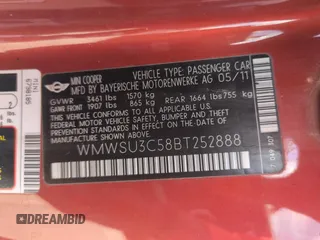 2011 MINI Hardtop z VIN WMWSU3C58BT252888, wystawiony jako Copart lot #55334725 z przebiegiem 59 701 mil mil oraz Szkody całkowita. Historia ofert i sprzedaży dostępna na DreamBid. Obrazek 13.