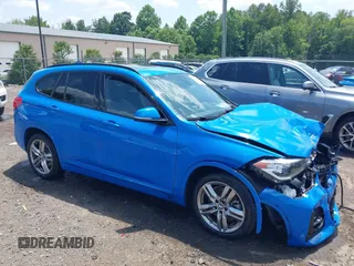 2021 BMW X1 xDrive28i with VIN WBXJG9C04M5T61811, listed as a IAAI auction lot 42509852 with 30,400 mi miles and . Bid and sale history available at DreamBid. Image 1.