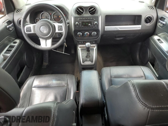 2016 Jeep Compass High Altitude z VIN 1C4NJDEB0GD709535, wystawiony jako Copart lot #61741985 z przebiegiem 80 924 mil mil oraz Szkoda całkowita • Salvage title. Historia ofert i sprzedaży dostępna na DreamBid. Obrazek 8.