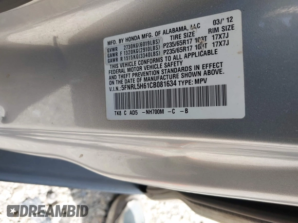 2012 Honda Odyssey EX-L with VIN 5FNRL5H61CB081634, listed as a IAAI auction lot 42760909 with 197,949 mi miles and . Bid and sale history available at DreamBid. Image 9.