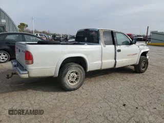 1997 Dodge Dakota z VIN 1B7GG23Y8VS161313, wystawiony jako Copart lot #77646454 z przebiegiem 286 443 mil mil oraz Szkoda całkowita • Salvage title. Historia ofert i sprzedaży dostępna na DreamBid. Obrazek 3.