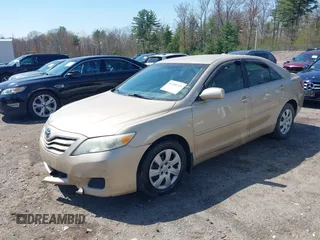 2011 Toyota Camry LE with VIN 4T1BF3EKXBU764478, listed as a IAAI auction lot 42180243 with 122,748 mi miles and . Bid and sale history available at carsss.com. Image 2.