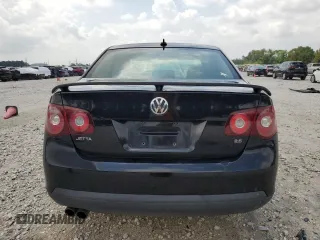 2009 Volkswagen Jetta SE z VIN 3VWRM71K49M055000, wystawiony jako Copart lot #54450045 z przebiegiem 163 451 mil mil oraz Szkoda całkowita • Salvage title. Historia ofert i sprzedaży dostępna na DreamBid. Obrazek 6.